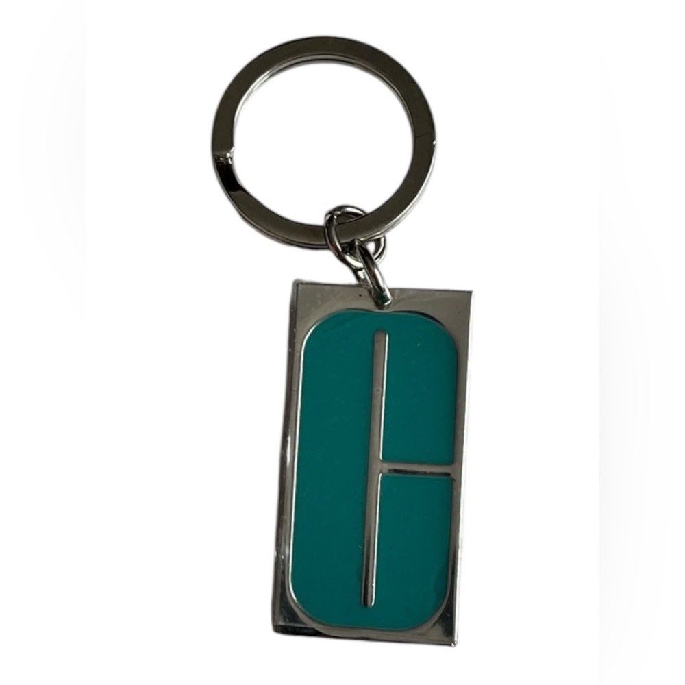 Vintage Clinique turquoise enamel c keychain 2” X 1”